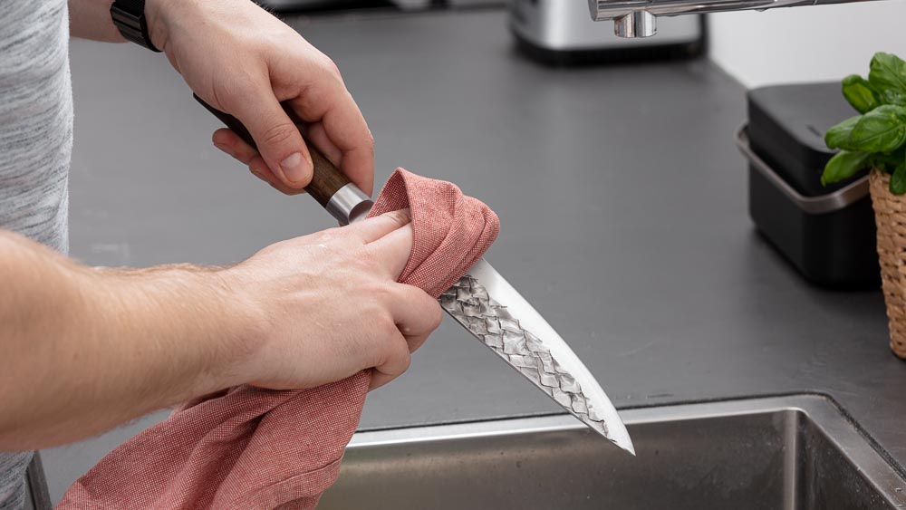 when must a knife be cleaned and sanitized
