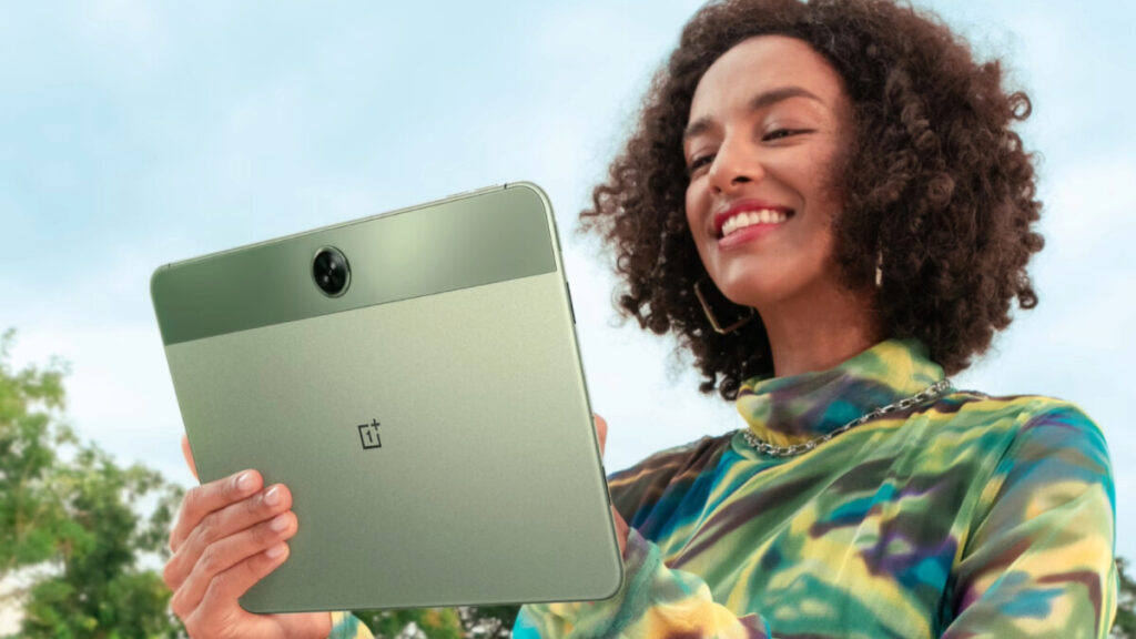 A woman holding OnePlus Pad Go