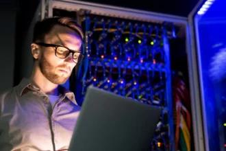 An image of a network administrator, one of the highest paying tech jobs without coding.